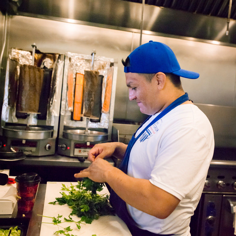 kitchen staff preparing ingredients