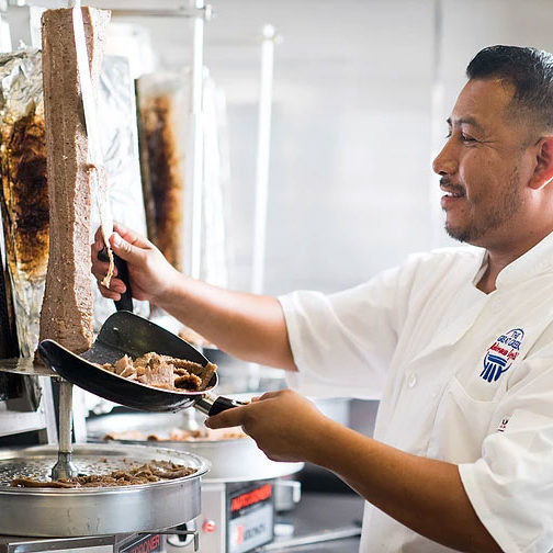 chef carving meat